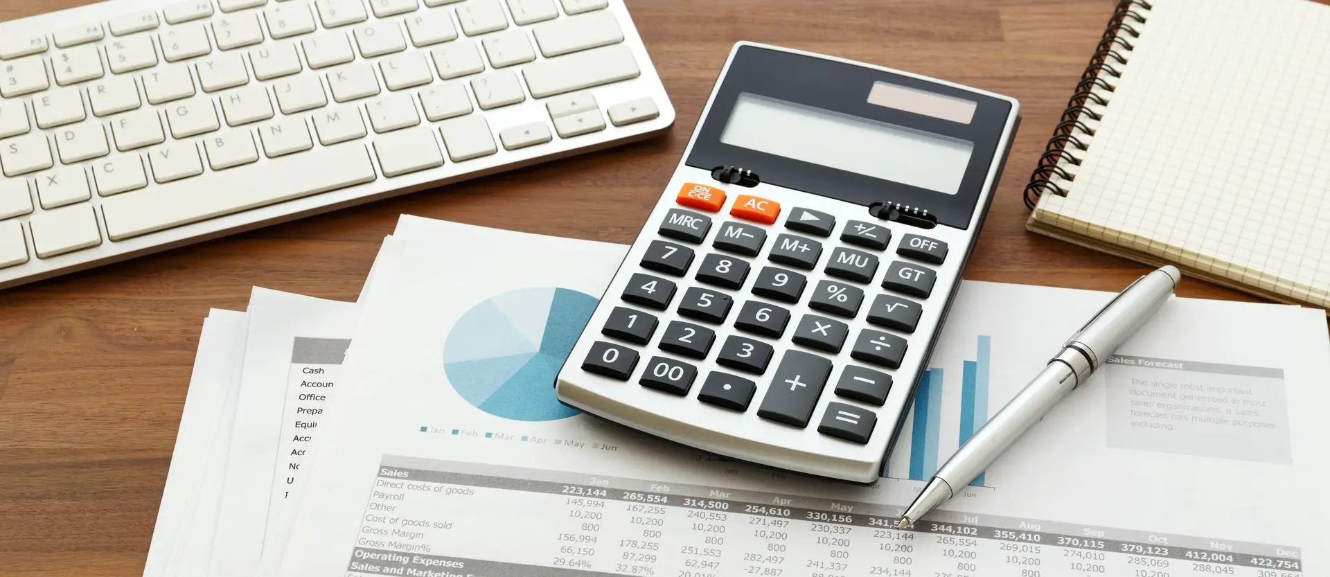 esk setup with calculator and financial documents for accounting work