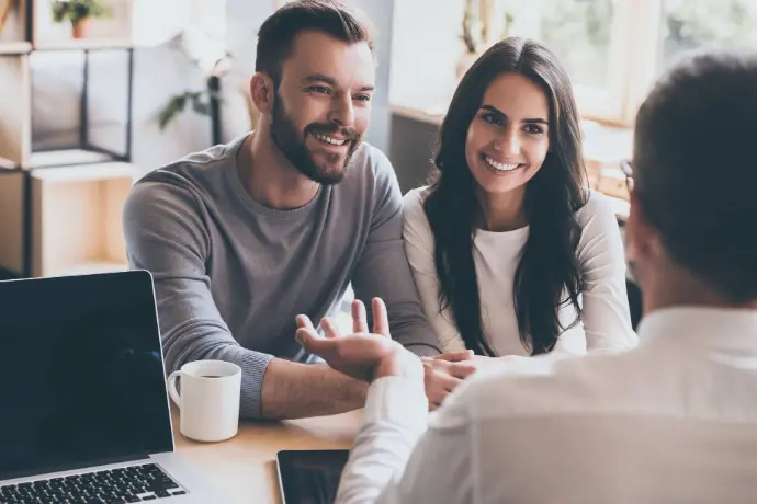 Happy couple getting a mortgage